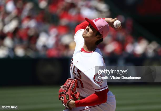 PItcher Shohei Ohtani of the Los Angeles Angels of Anaheim pitches in the fourth inning during the MLB game against the Minnesota Twins at Angel...