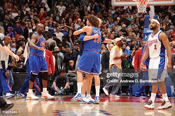 Anderson Varejao and Zydrunas Ilgauskas of the Cleveland Cavaliers celebrate a win over the Los Angeles Clippers at Staples Center on January 16,...