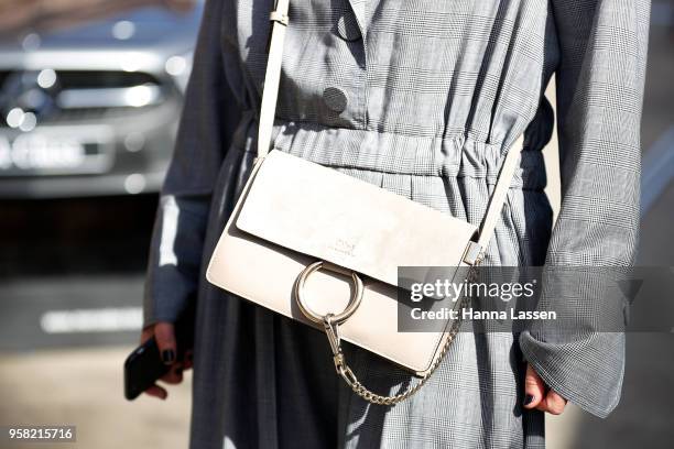 Penny McCarthy wearing Michael Lo Sordo jumpsuit and Chloe clutch during Mercedes-Benz Fashion Week Resort 19 Collections at Carriageworks on May 14,...