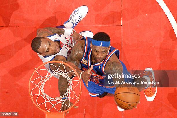 LeBron James of the Cleveland Cavaliers goes up for a shot against Rasual Butler of the Los Angeles Clippers at Staples Center on January 16, 2010 in...