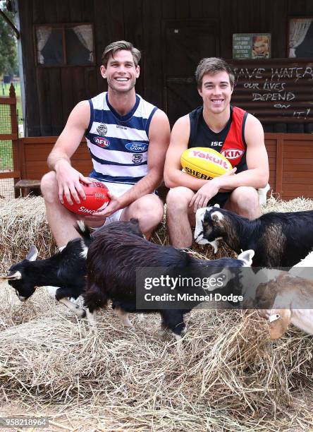 Tom Hawkins of the Cats and Zach Merrett of the Bombers pose during the Powercor Country Festival Launch at Melbourne Cricket Ground on May 14, 2018...