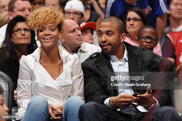 Recording Artist Rihanna and Los Angeles Dodgers player Matt Kemp attend a game between the Cleveland Cavaliers and the Los Angeles Clippers at...