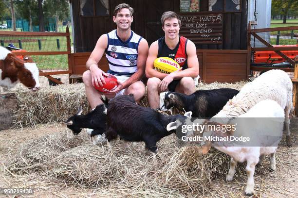 Tom Hawkins of the Cats and Zach Merrett of the Bombers pose during the Powercor Country Festival Launch at Melbourne Cricket Ground on May 14, 2018...