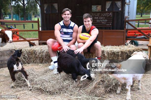 Tom Hawkins of the Cats and Zach Merrett of the Bombers pose during the Powercor Country Festival Launch at Melbourne Cricket Ground on May 14, 2018...