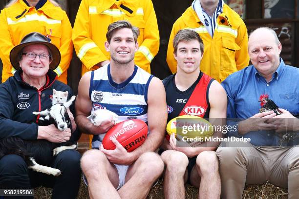 Legend Essendon Bombers former coach Kevin Sheedy with Tom Hawkins of the Cats, Zach Merrett of the Bombers and Cats legend Billy Brownless during...