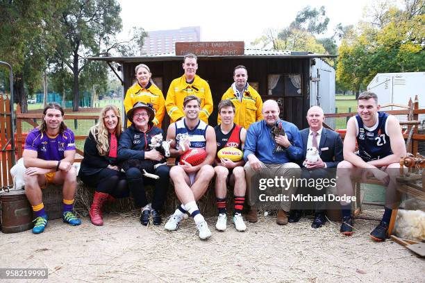 Legend Essendon Bombers former coach Kevin Sheedy with Tom Hawkins of the Cats and Zach Merrett of the Bombers pose during Launch at Melbourne...