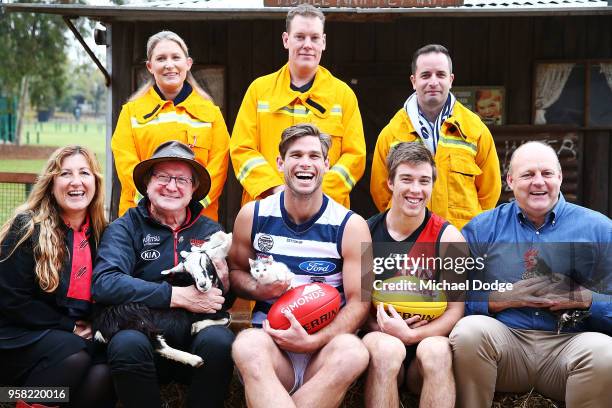 Legend Essendon Bombers former coach Kevin Sheedy with Tom Hawkins of the Cats, Zach Merrett of the Bombers and Cats legend Billy Brownless during...