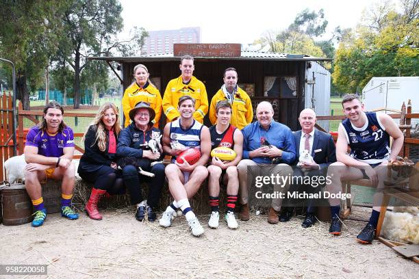 Legend Essendon Bombers former coach Kevin Sheedy with Tom Hawkins of the Cats and Zach Merrett of the Bombers pose during Launch at Melbourne...