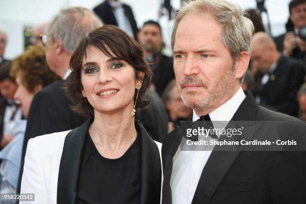 Geraldine Pailhas and Christopher Thompson attends the "Sink Or Swim " Photocall during the 71st annual Cannes Film Festival at Palais des Festivals...