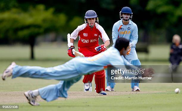 Mark Chapman of Hong Kong bats as Gaurav Jathar of India fields the ball during the ICC U19 Cricket World Cup match between India and Hong Kong at...