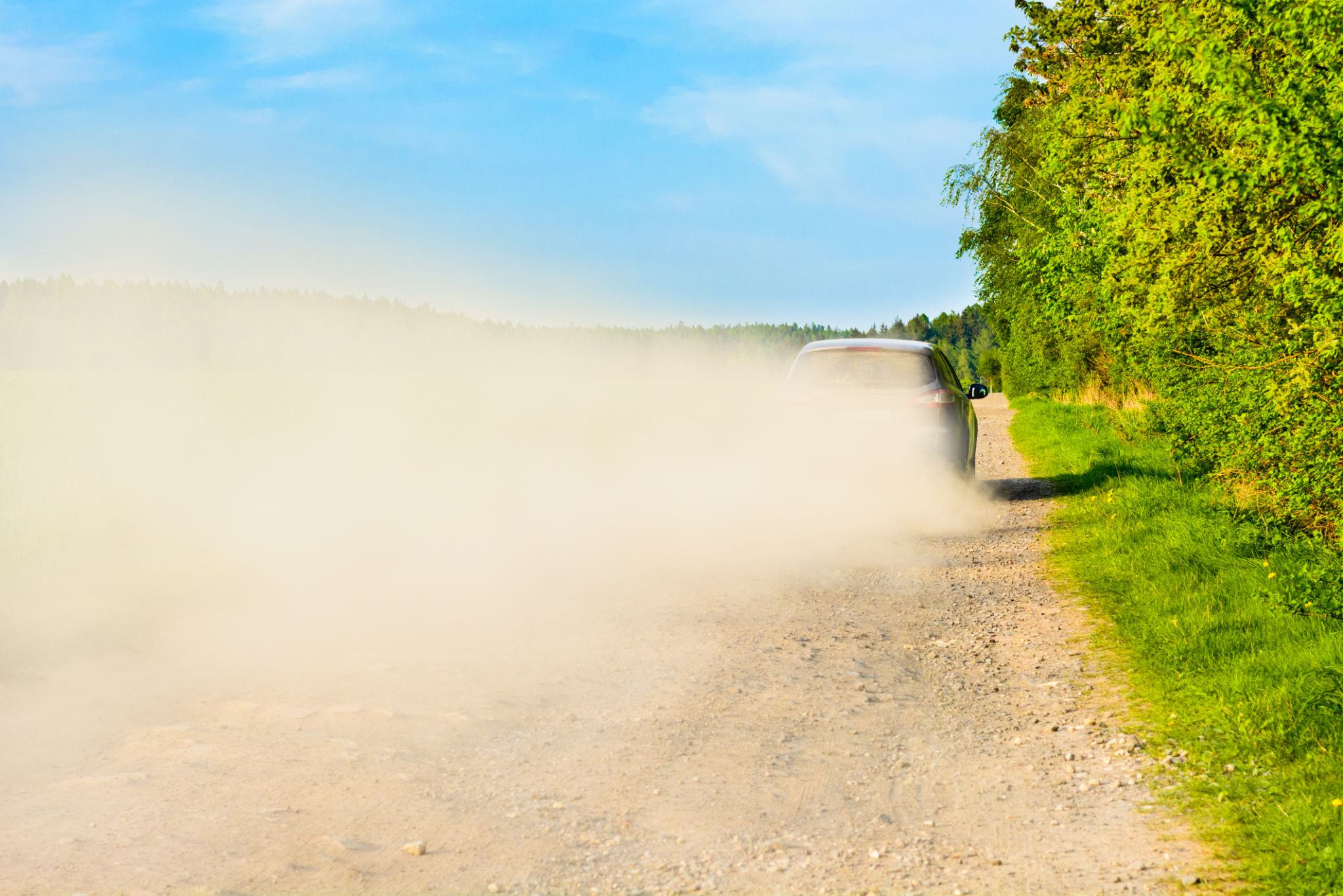 dusty road car
