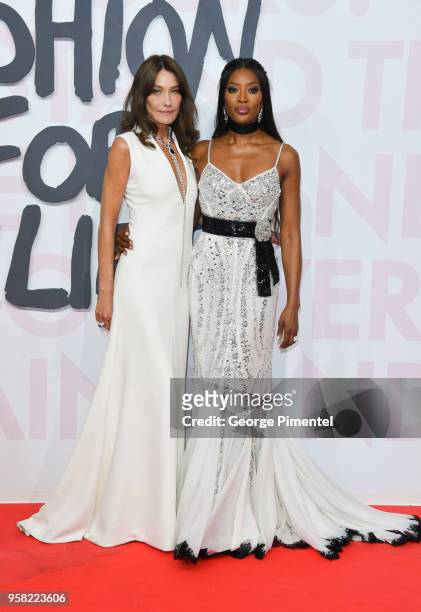 Carla Bruni and Naomi Campbell attend Fashion For Relief Cannes 2018 during the 71st annual Cannes Film Festival at Aeroport Cannes Mandelieu on May...