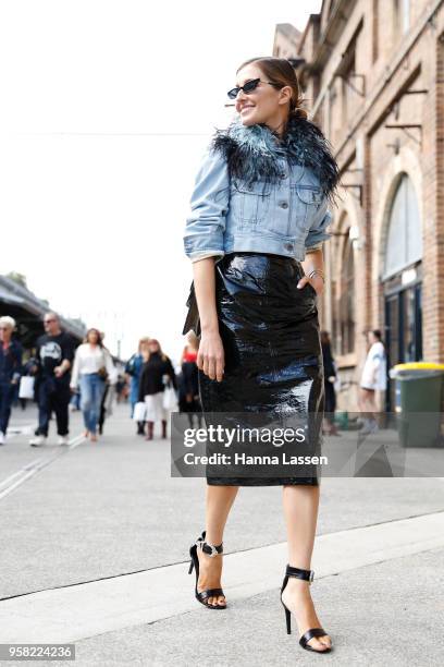 Kate Waterhouse wearing Prada denim jacket and Poppy Lissiman sunglasses during Mercedes-Benz Fashion Week Resort 19 Collections at Carriageworks on...