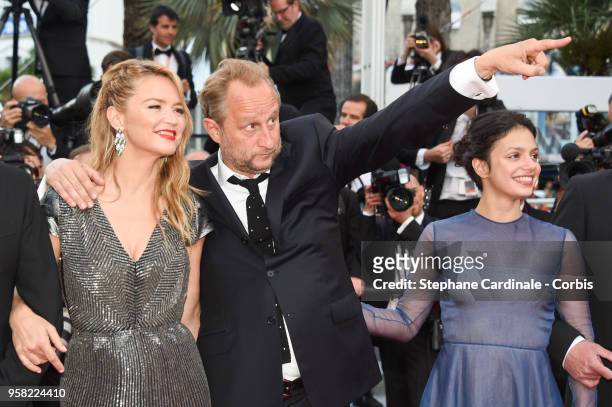 Virginie Efira, Benoit Poelvoorde and Noee Abita attends the "Sink Or Swim " Photocall during the 71st annual Cannes Film Festival at Palais des...