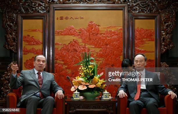 Brazilian Foreign Minister Aloysio Nunes speaks Chinese Vice President Wang Qishan at Zhongnanhai Leadership Compound in Beijing on May 14, 2018.