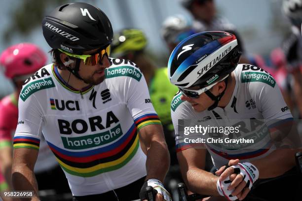 Peter Sagan of Slovakia and Team Bora - Hansgrohe and his brother Juraj Sagan of Slovakia and Team Bora - Hansgrohe stand on the start line during...