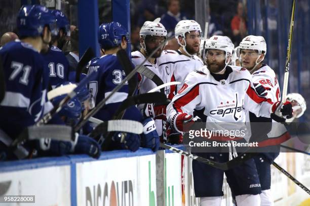 Brett Connolly of the Washington Capitals argues with Yanni Gourde of the Tampa Bay Lightning during the third period in Game Two of the Eastern...