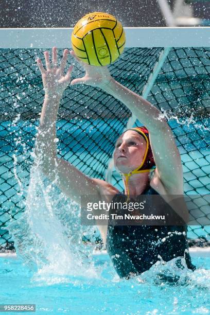 Amanda Longan of the University of Southern California blocks a Stanford University shot attempt during the Division I Women's Water Polo...