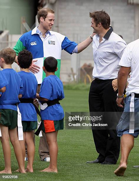 Prince William and Richie McCaw share a joke as the Prince visits Eden Park Stadium on the first day of his visit to New Zealand on January 17, 2010...