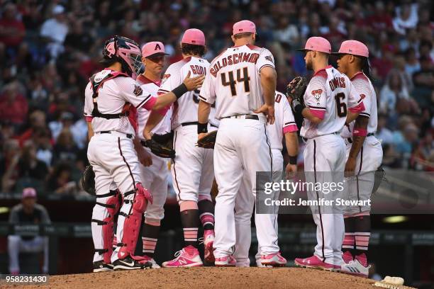 Manager Torey Lovullo of the Arizona Diamondbacks relieves Zack Godley in the seventh inning of the MLB game against the Washington Nationals at...