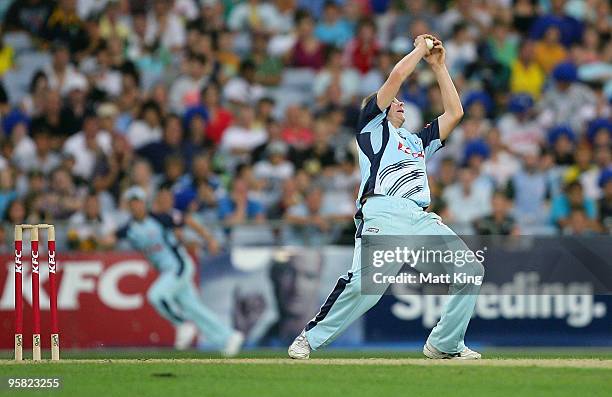 Steve Smith of the Blues catches Aaron O'Brien of the Redbacks of his own bowling during the Twenty20 Big Bash match between the New South Wales...