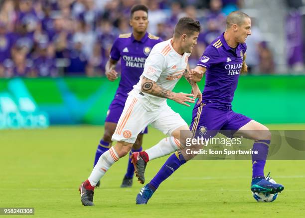 Orlando City midfielder Will Johnson looking to pass off the ball during the MLS soccer match between the Orlando City and the Atlanta United on May...