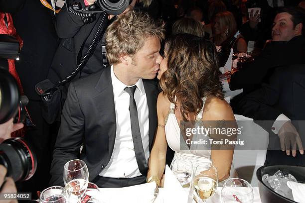 Oliver Geissen kissing his wife Christina Plate attend the 37 th German Filmball 2010 at the hotel Bayrischer Hof on January 16, 2010 in Munich,...