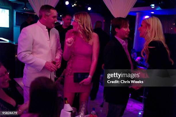 Tareq Salahi , Michaele Salahi , the White House party crashers, and guests attend Pure Nightclub on January 16, 2010 in Las Vegas, Nevada.