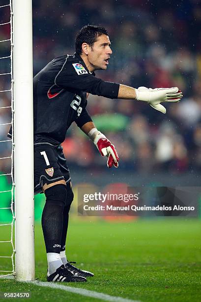 Andres Palop of Sevilla lines up his defensive wall at a free kick during the La Liga match between Barcelona and Sevilla at the Camp Nou stadium on...