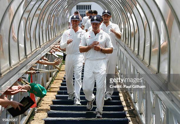 Captain Andrew Strauss of England leads his team-mates down the tunnel from the players balcony following England's defeat to South Africa during day...
