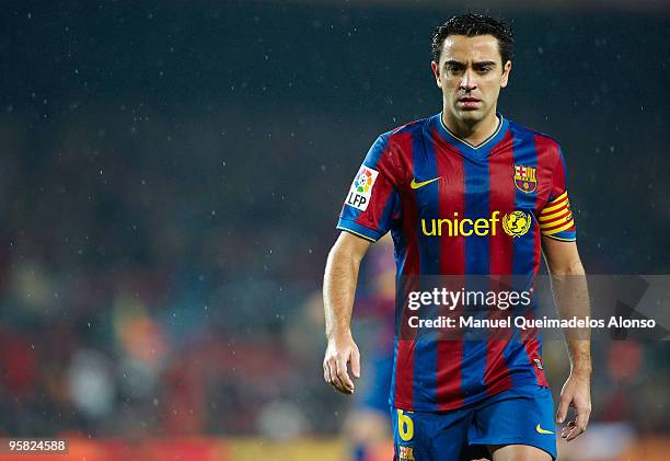 Xavi Hernandez of FC Barcelona looks on during the La Liga match between Barcelona and Sevilla at the Camp Nou stadium on January 16, 2010 in...