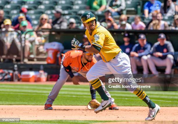 Oakland Athletics Designated hitter Khris Davis heads to second base during the game between the Houston Astros and the Oakland Athletics on May 9,...