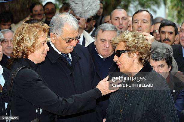 Italian Secretary of State Stefania Gabriella Anastasia Craxi , Tunisian Foreign Minister Kamel Morjane comfort Bettino Craxi's widow, Anna , during...