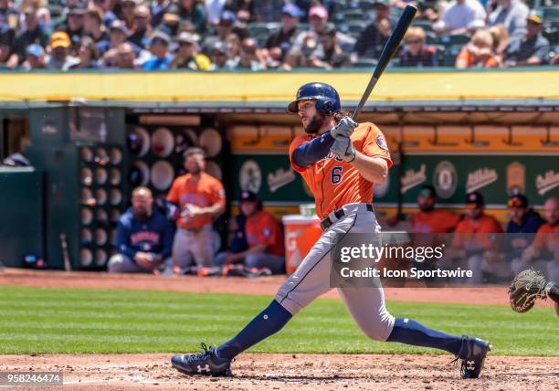 Houston Astros Center field Jake Marisnick watches his fly ball during the game between the Houston Astros and the Oakland Athletics on May 9, 2018...