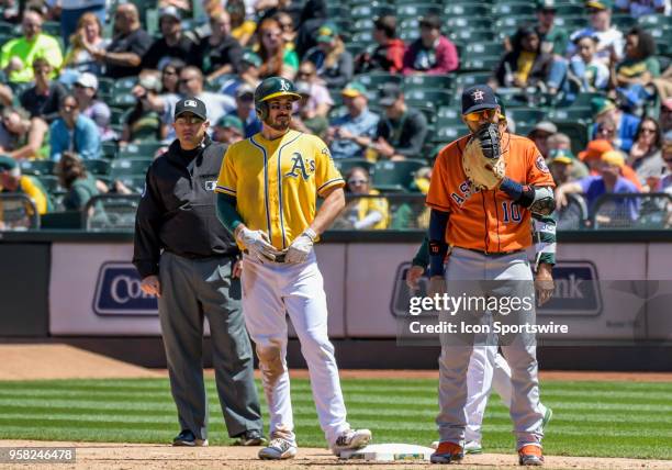 Oakland Athletics Outfield Matt Joyce gets to first base off a ground ball during the game between the Houston Astros and the Oakland Athletics on...