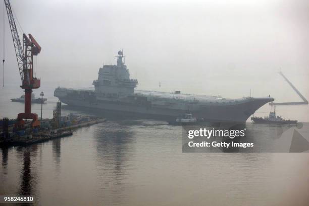 China's first home-built aircraft carrier sets out from a port of Dalian DSIC Shipyard for sea trials on May 13, 2018 in Dalian, Liaoning Province of...