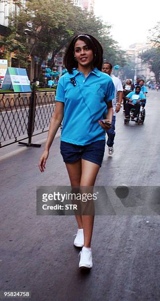 Indian Bollywood personality Genelia D'Souza participates in the Standard Chartered Mumbai Marathon 2010 in Mumbai on January 17, 2010. The seventh...