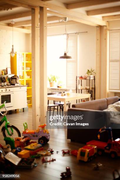 interior of messy living room - messy living room stock pictures, royalty-free photos & images
