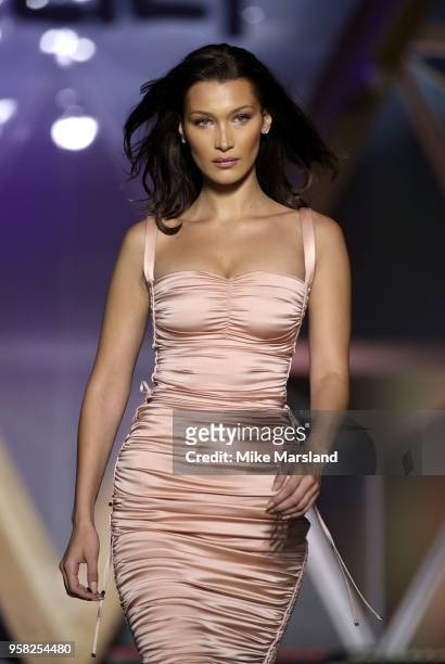 Bella Hadid walks the runway during Fashion For Relief Cannes 2018 during the 71st annual Cannes Film Festival at Aeroport Cannes Mandelieu on May...