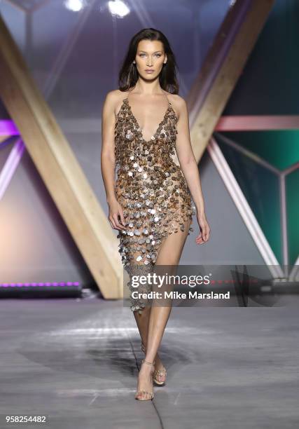 Bella Hadid walks the runway during Fashion For Relief Cannes 2018 during the 71st annual Cannes Film Festival at Aeroport Cannes Mandelieu on May...