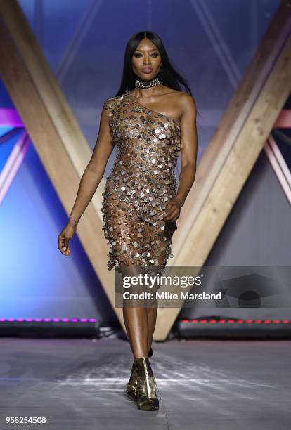 Naomi Campbell walks the runway during Fashion For Relief Cannes 2018 during the 71st annual Cannes Film Festival at Aeroport Cannes Mandelieu on May...