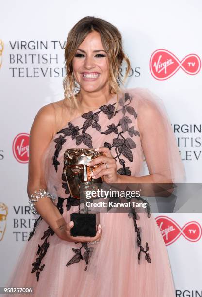 Caroline Flack poses with the award for Best Reality and Constructed Factual Series for 'Love Island' in the press room during the Virgin TV British...