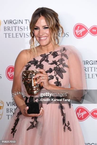 Caroline Flack poses with the award for Best Reality and Constructed Factual Series for 'Love Island' in the press room during the Virgin TV British...