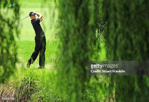 Charl Schwartzel of South Africa plays his tee shot on the 16th hole during the final round of the Joburg Open at Royal Johannesburg and Kensington...