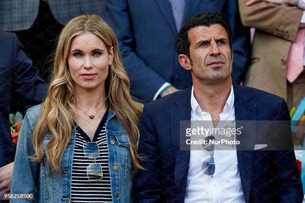Former Portuguese football player Luis Figo and his wife the Swedish model Helen Svedin attend day nine of the Mutua Madrid Open tennis tournament at...
