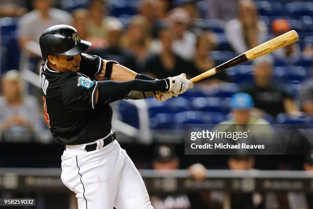 Martin Prado of the Miami Marlins at bat against the Atlanta Braves at Marlins Park on May 11, 2018 in Miami, Florida.