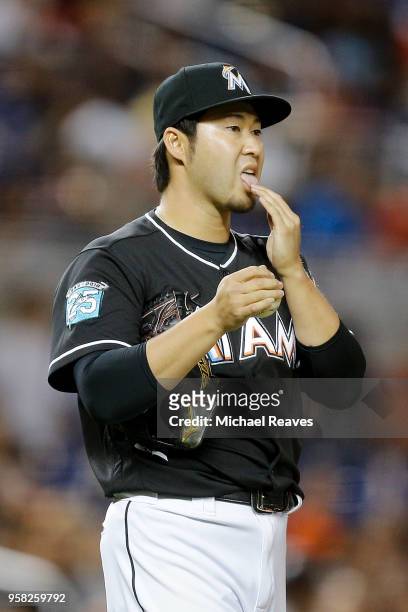 Junichi Tazawa of the Miami Marlins in action against the Atlanta Braves at Marlins Park on May 11, 2018 in Miami, Florida.