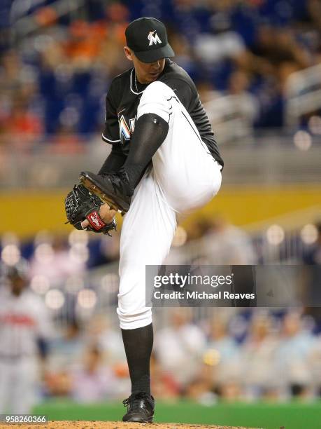 Brad Ziegler of the Miami Marlins delivers a pitch in the ninth inning against the Atlanta Braves at Marlins Park on May 11, 2018 in Miami, Florida.