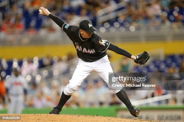 Brad Ziegler of the Miami Marlins delivers a pitch in the ninth inning against the Atlanta Braves at Marlins Park on May 11, 2018 in Miami, Florida.