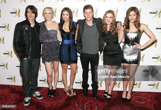 Cast members of "The Vampire Diaries," from left, Steven McQueen, Candice Accola, Nina Dobrey, Zach Roerig, Sara Canning and Kayla Ewell arrive at a...
